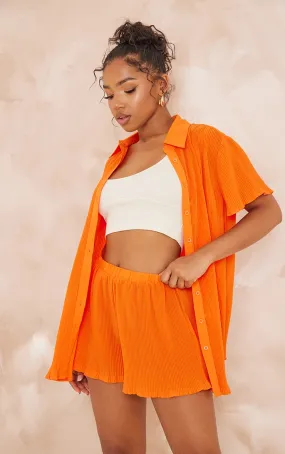 Chemise oversize plissée orange vif à manches courtes et boutons