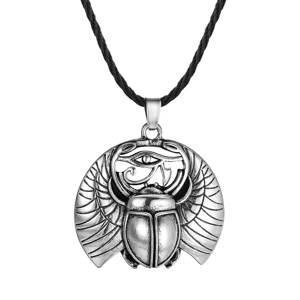 Collier vintage noir avec pendentif œil d'Horus • Vintage Univers