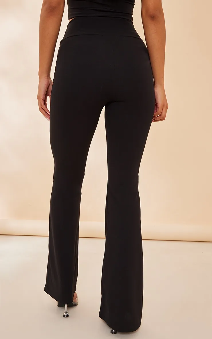 Pantalon flare en crêpe noir à taille croisée