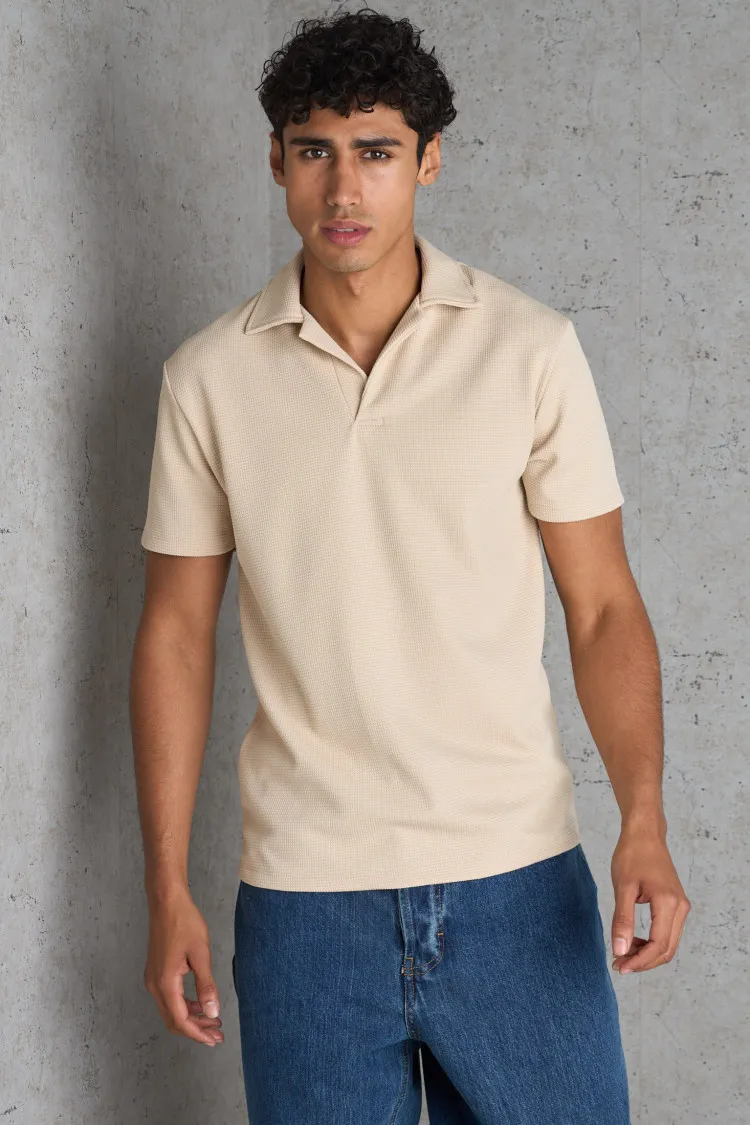 Polo basic beige texturé