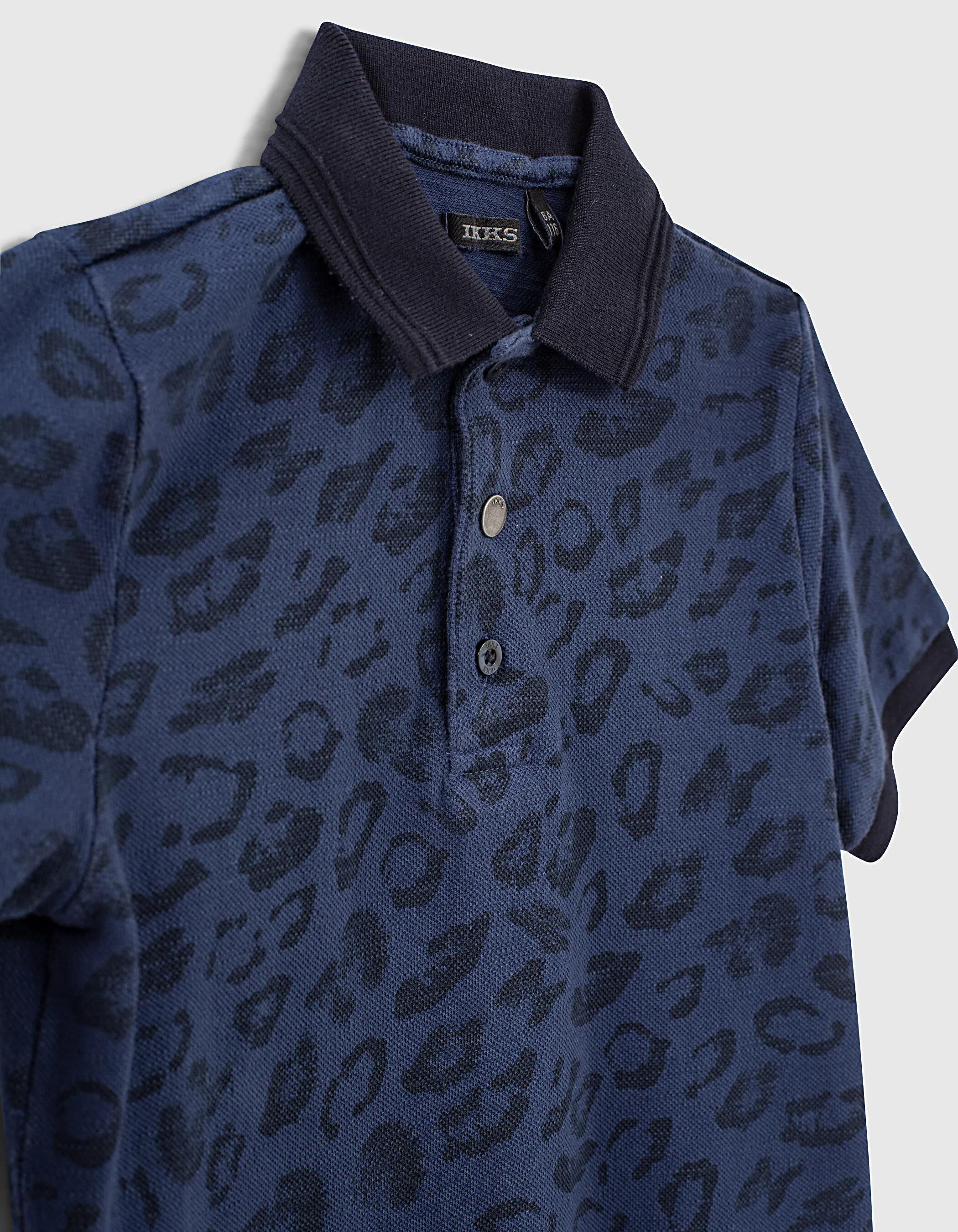 Polo indigo bio à motif léopard garçon 