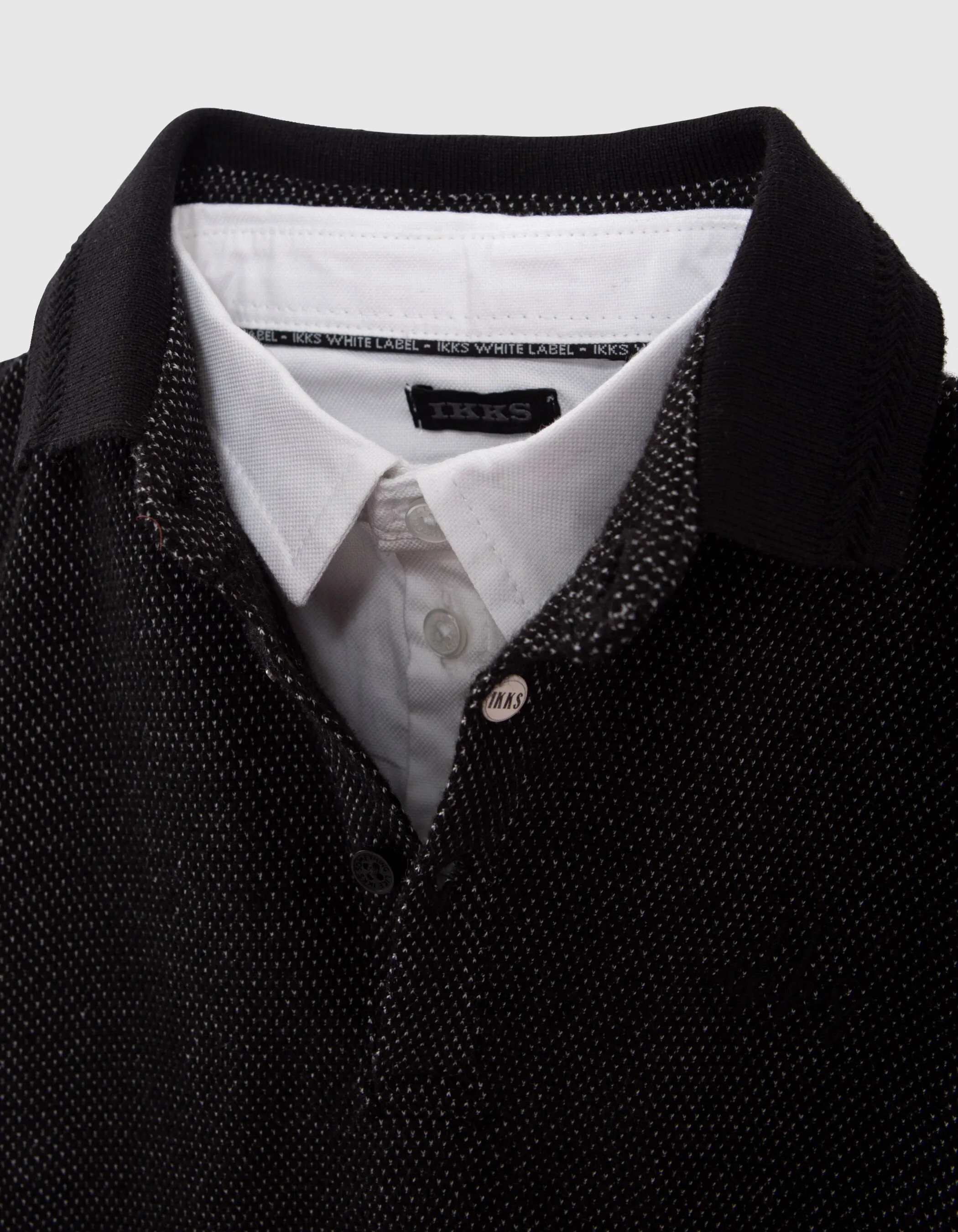 Polo noir trompe-l'oeil col chemise blanc garçon