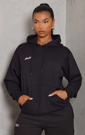 PRETTYLITTLETHING Hoodie oversize noir avec détail badge à logo